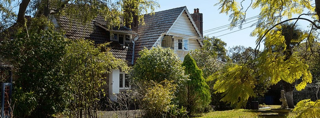 An image of Beecroft House with its beautiful garden in the sunshine